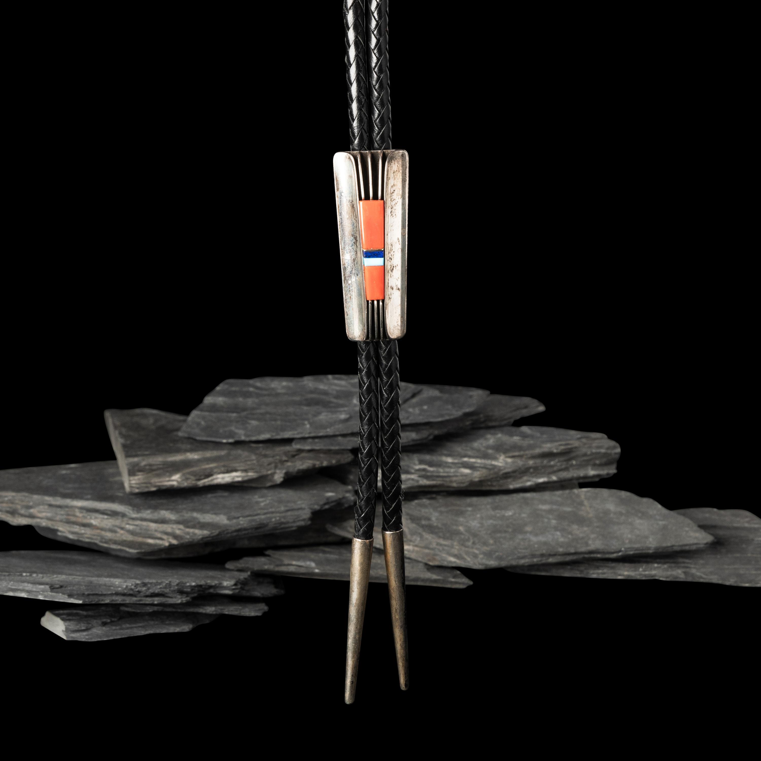 Victor Beck (Diné, 1941-2022) — Fluted Silver Bolo Tie with Inlay