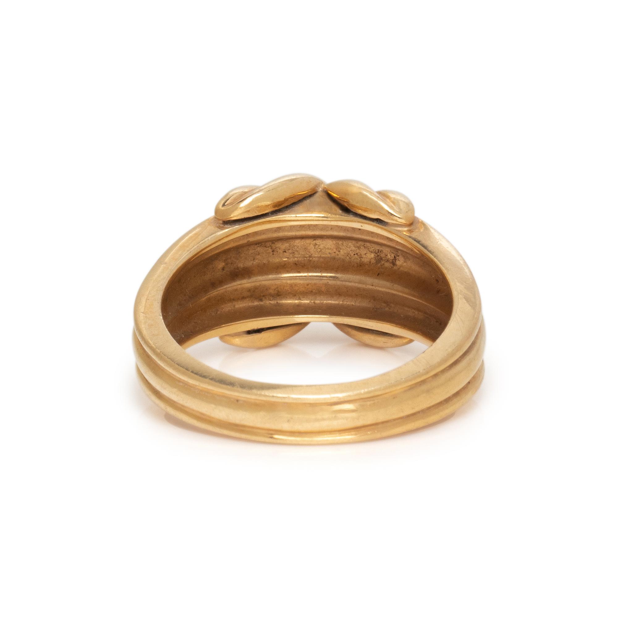TIFFANY & CO., YELLOW GOLD 'SIGNATURE X' RING