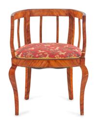 An Italian Rococo Style Gilt Metal Mounted Olivewood Desk and an Associated Chair