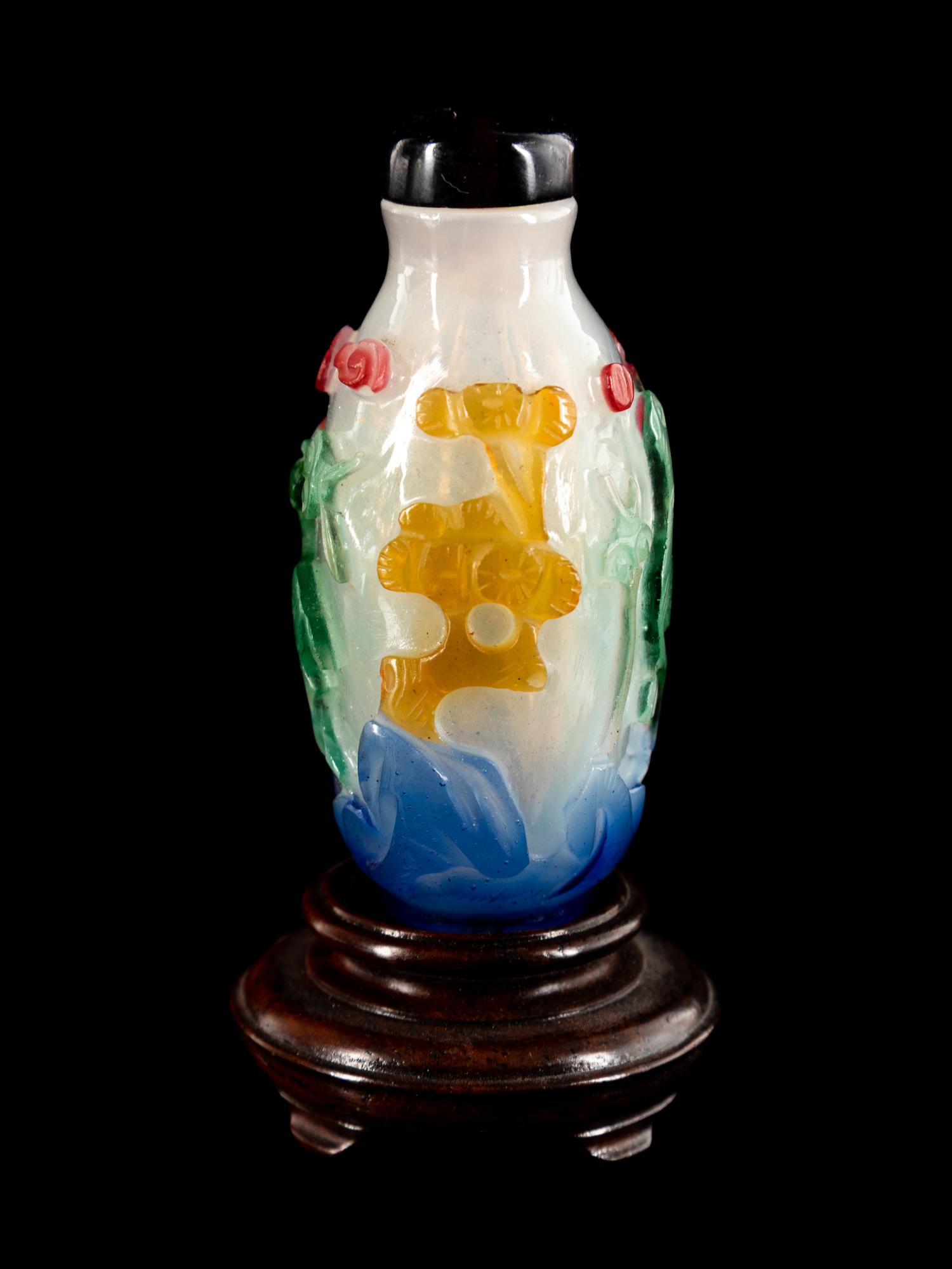 A Chinese Multi-Colored Overlay Translucent White Peking Glass Snuff Bottle