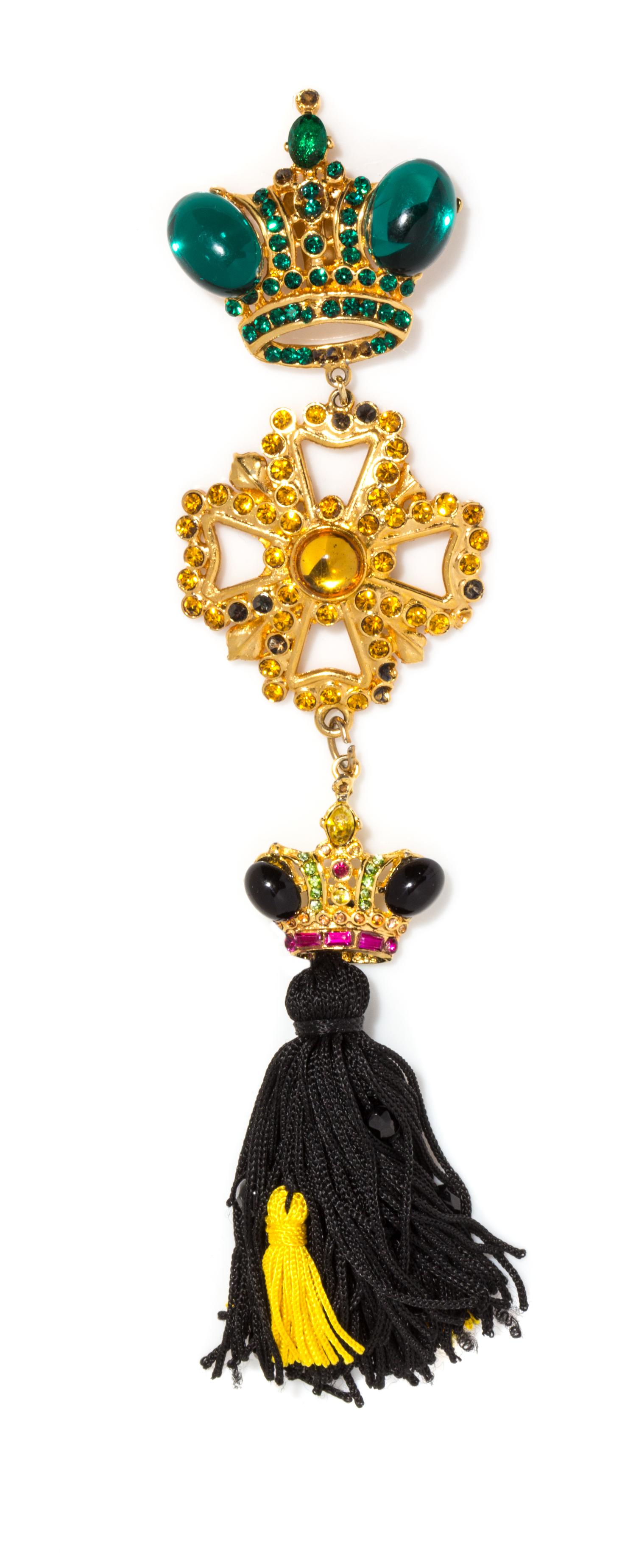 A Gianni Versace Single Runway Drop Earclip, 2" x 8".