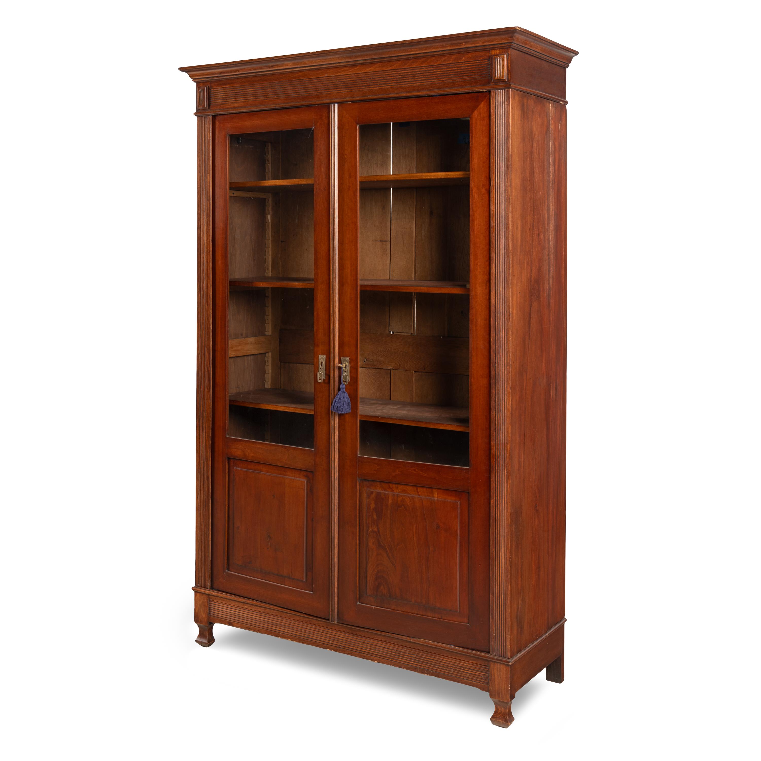 A Pair of English Mahogany Bookcase Cabinets