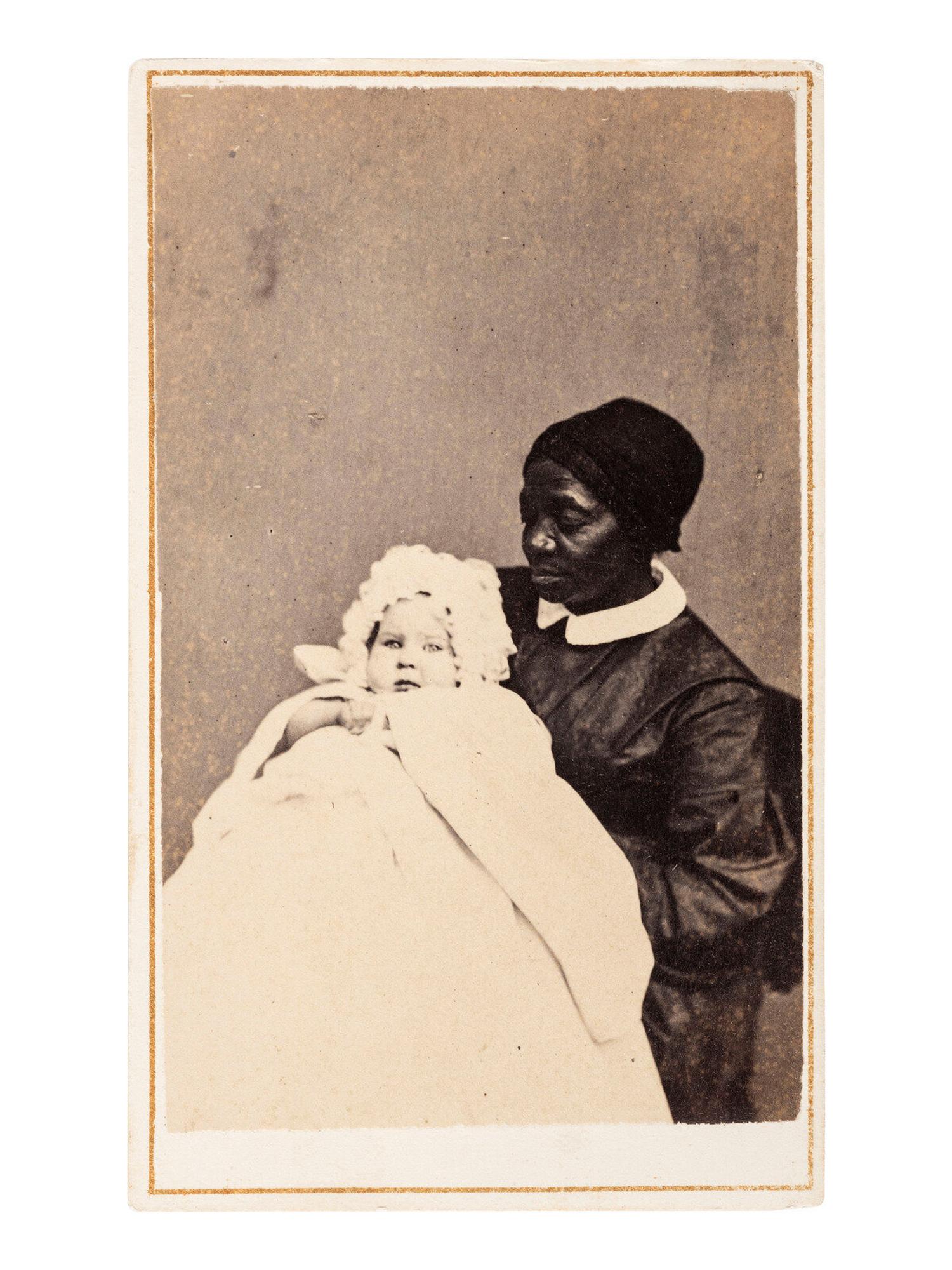 [EARLY PHOTOGRAPHY]. A group of 3 photographs of African American subjects posed with white children.