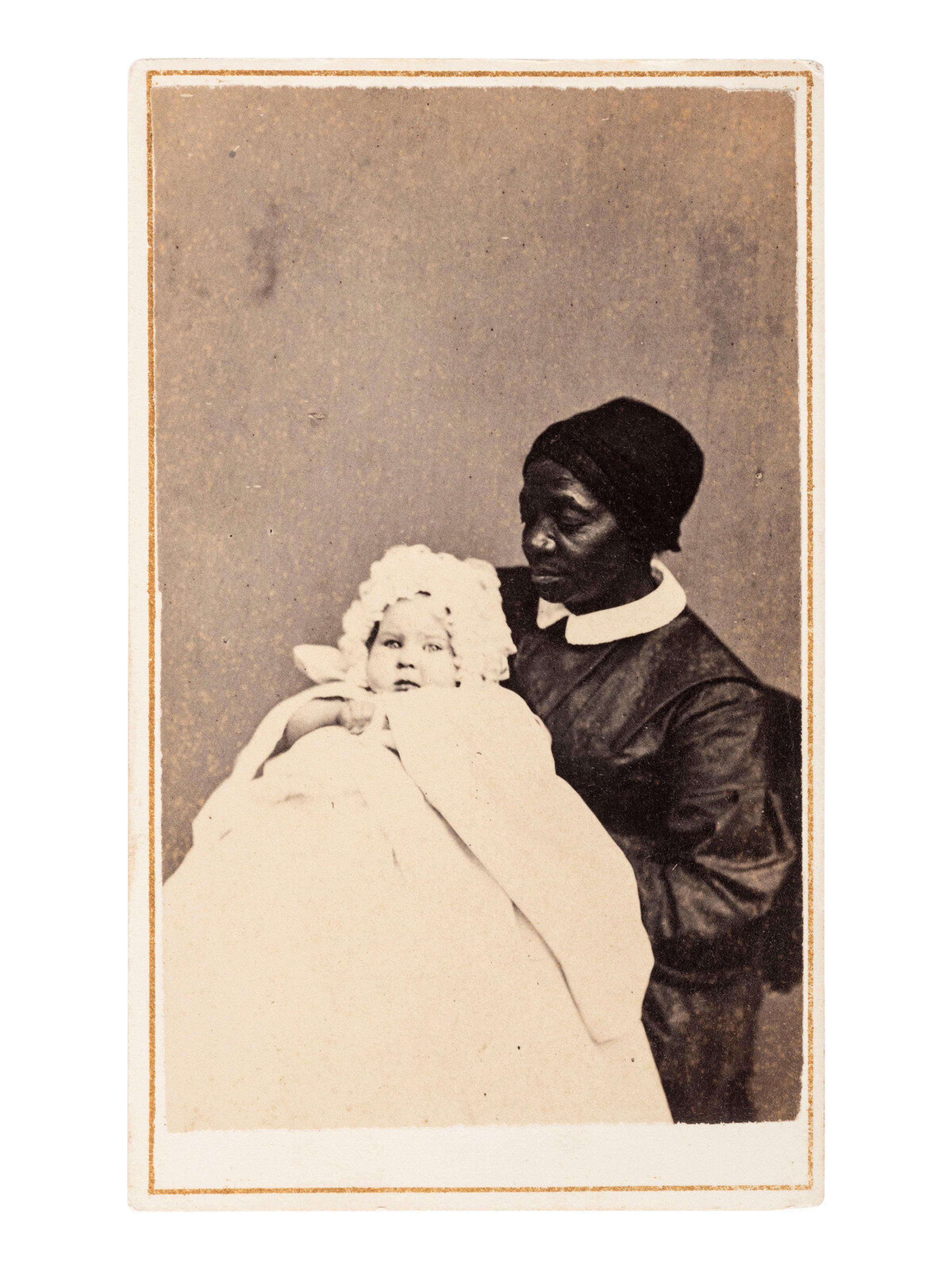 [EARLY PHOTOGRAPHY]. A group of 3 photographs of African American subjects posed with white children.