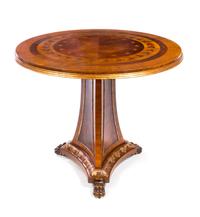 A Regency Style Parcel Gilt Satinwood and Marquetry Table Height 30 x diameter of top 34 1/2 inches. — 20TH CENTURY