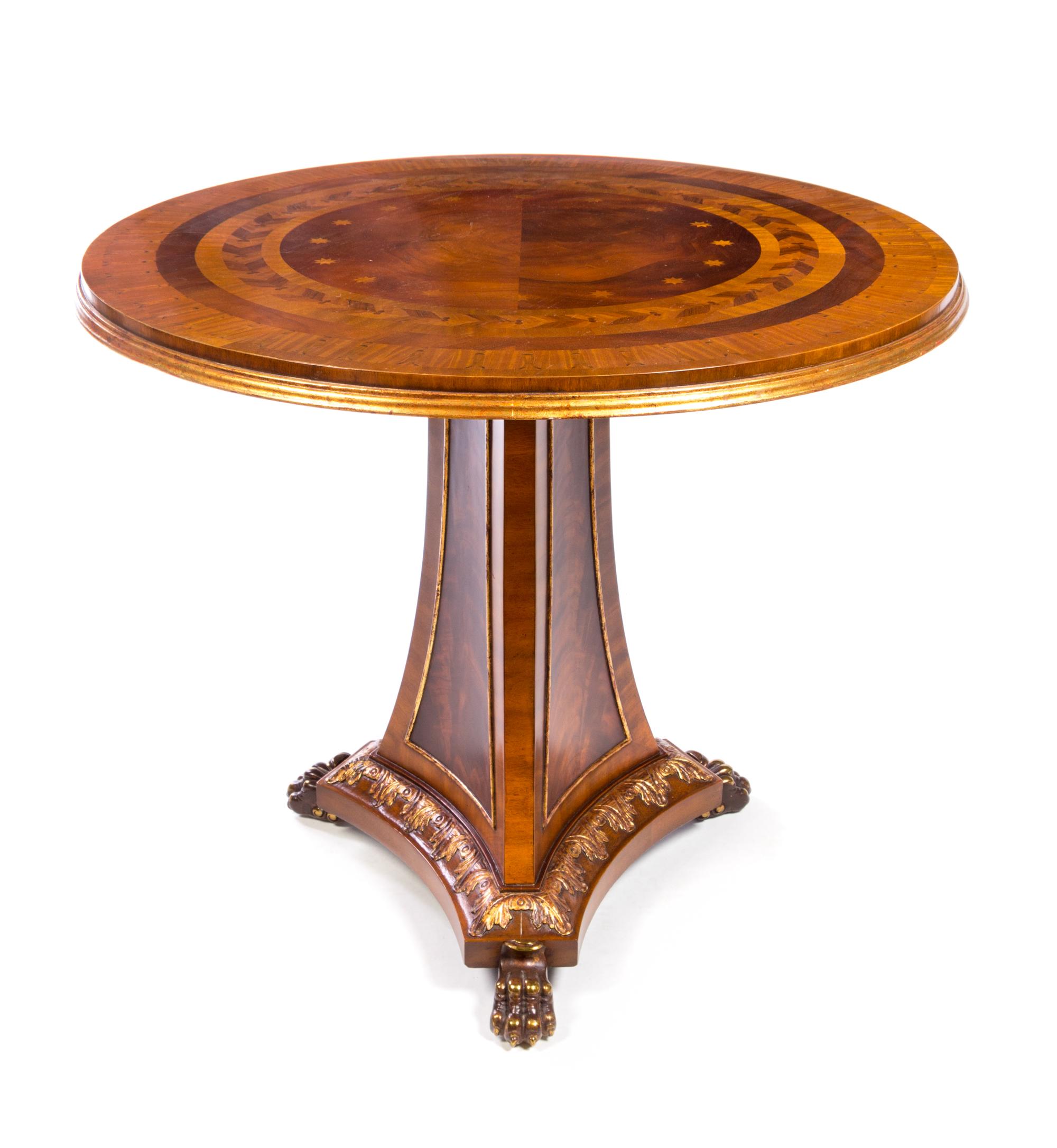 A Regency Style Parcel Gilt Satinwood and Marquetry Table Height 30 x diameter of top 34 1/2 inches. — 20TH CENTURY