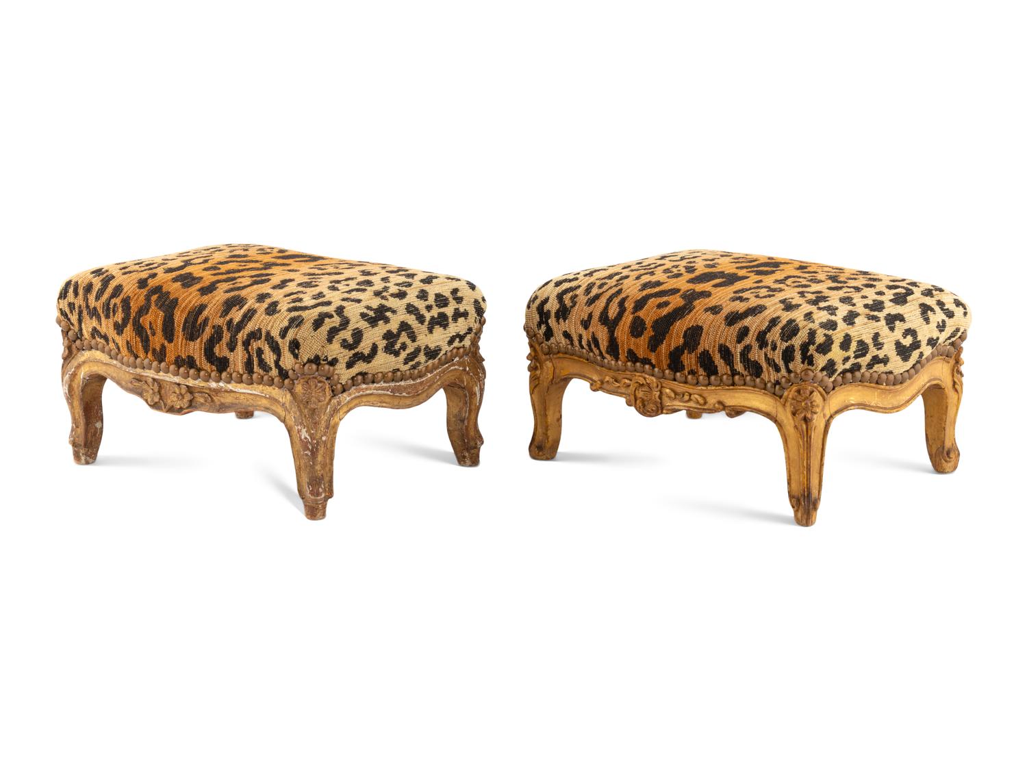 A Near Pair of Louis XV Giltwood Tabourets