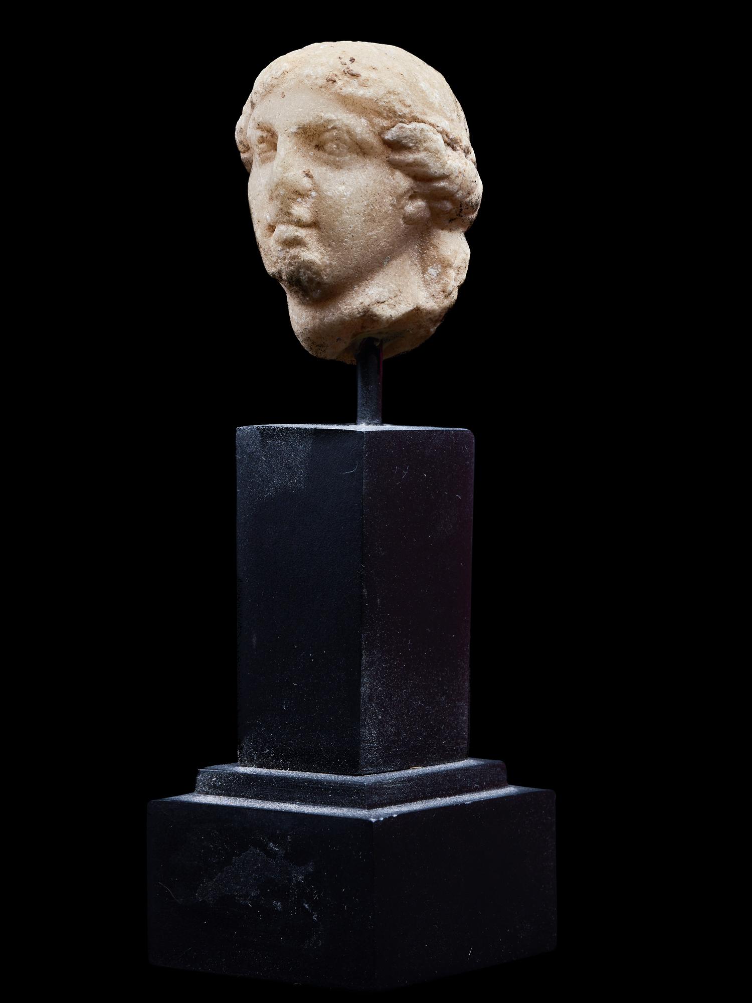 A Roman Marble Head of a Goddess