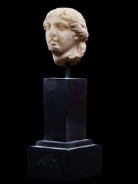 A Roman Marble Head of a Goddess