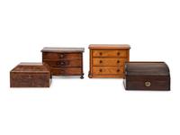 An English Yew Wood Tea Caddy, Two Diminutive Chests of Drawers and a Writing Box