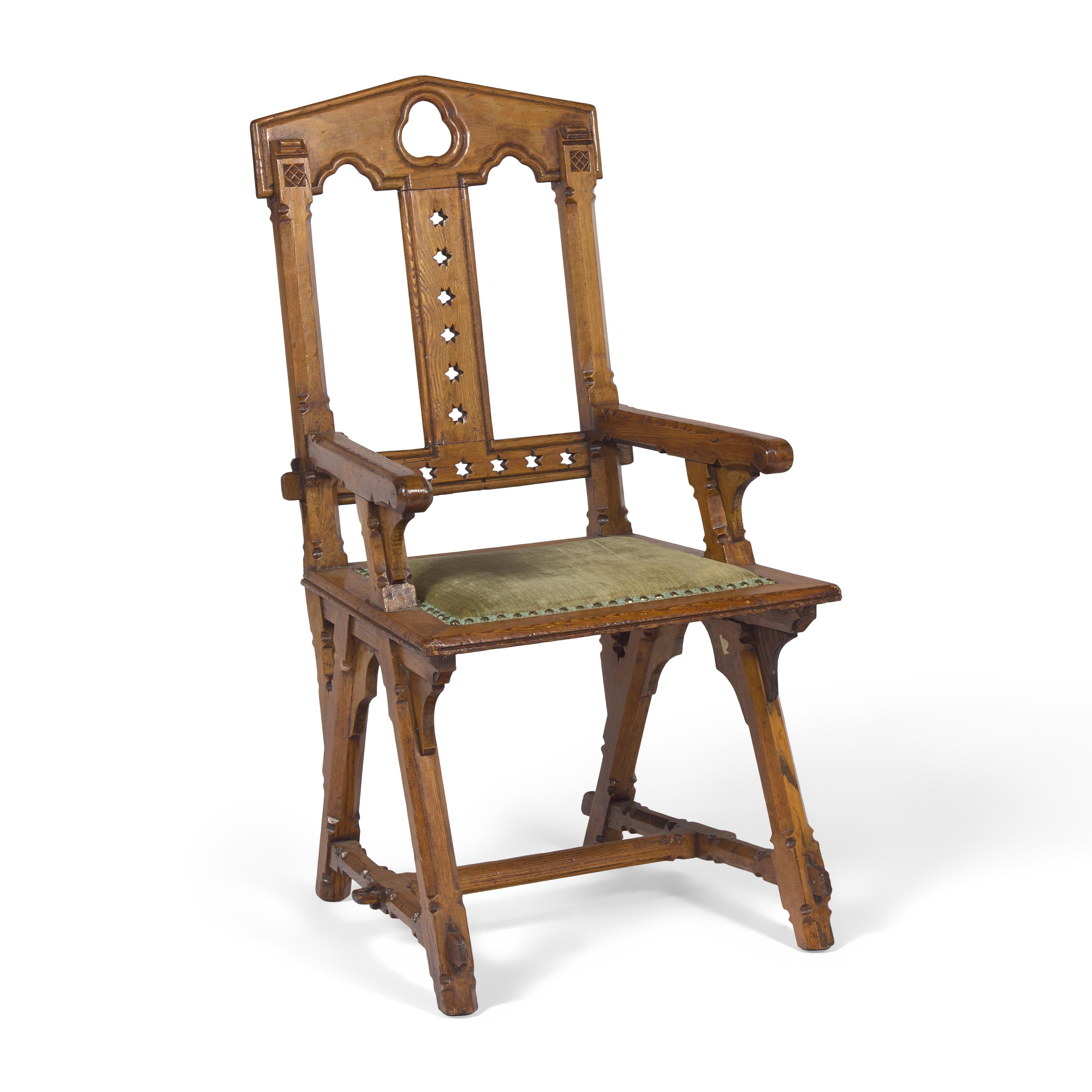 A Gothic Revival Patent Gothic Star Walnut Arm Chair