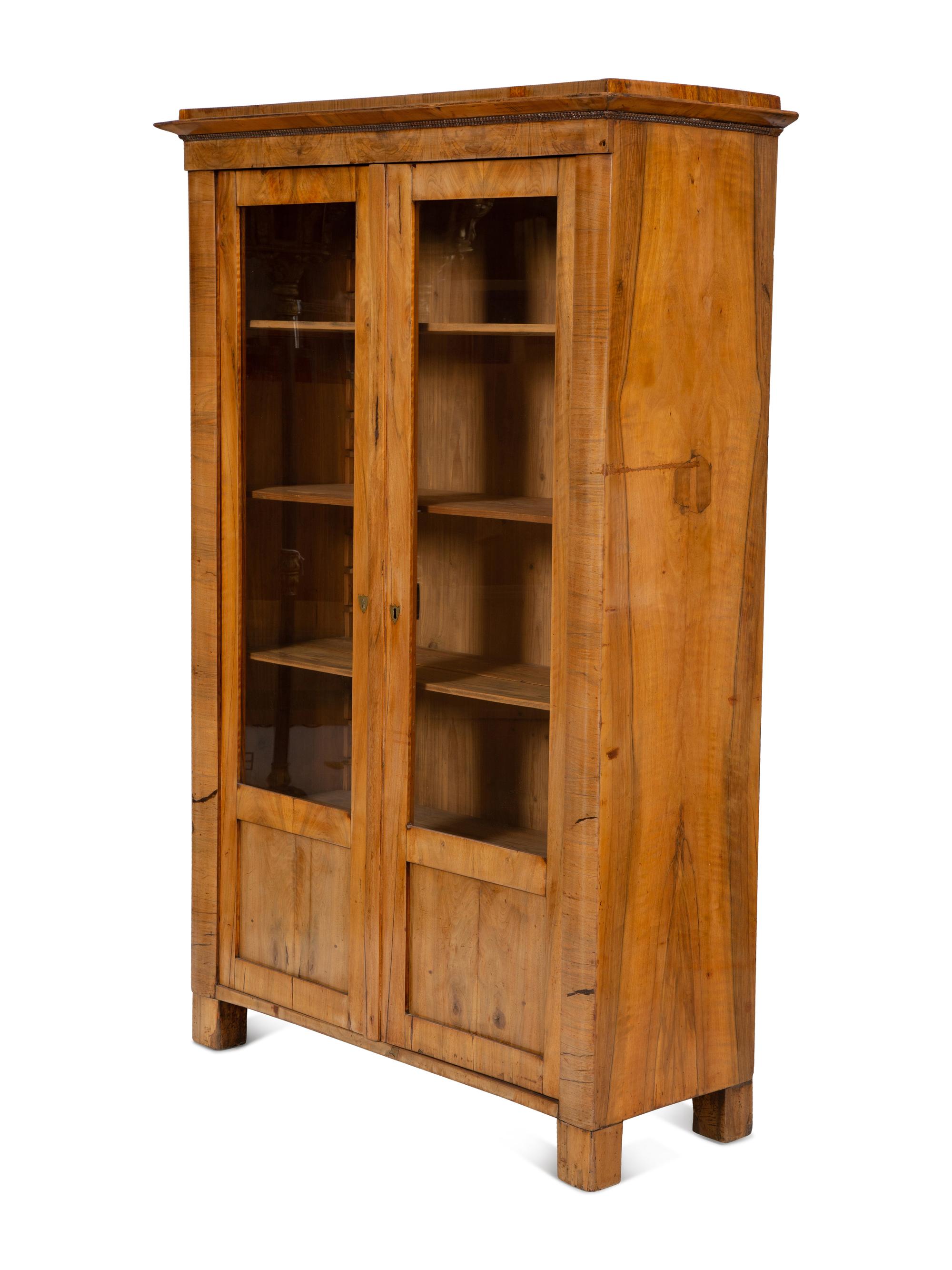 A Pair of Biedermeier Figured Birch Bookcases