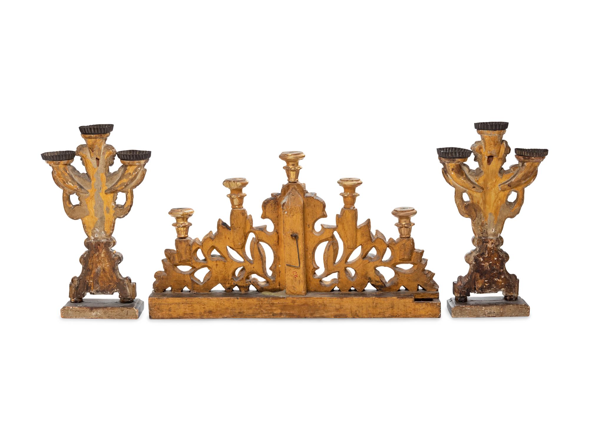 A Pair of Italian Painted and Parcel Gilt Three-Light Candelabra