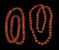 Two Amber Beaded Necklaces Length of longest 26 1/2 inches.