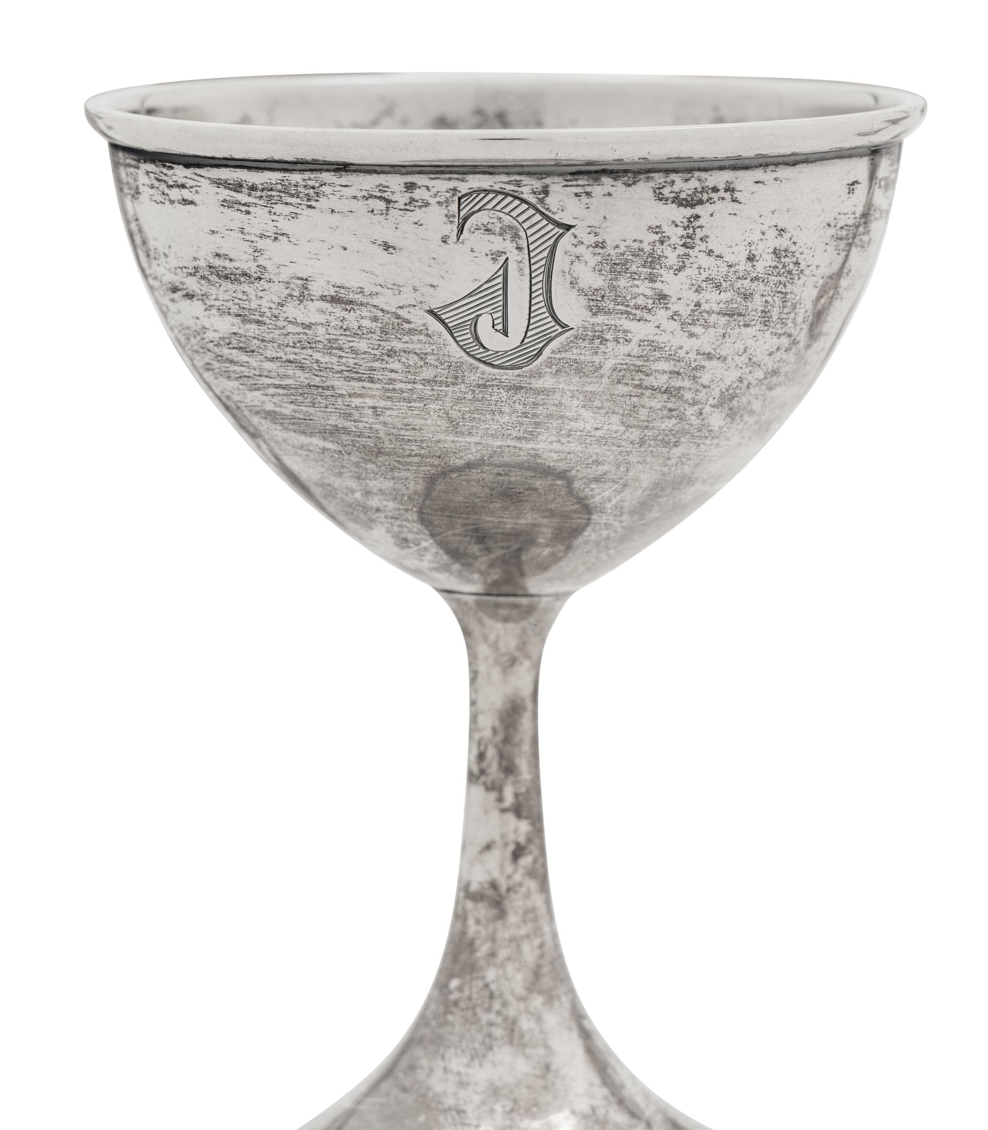A Set of Eight American Silver Coupes