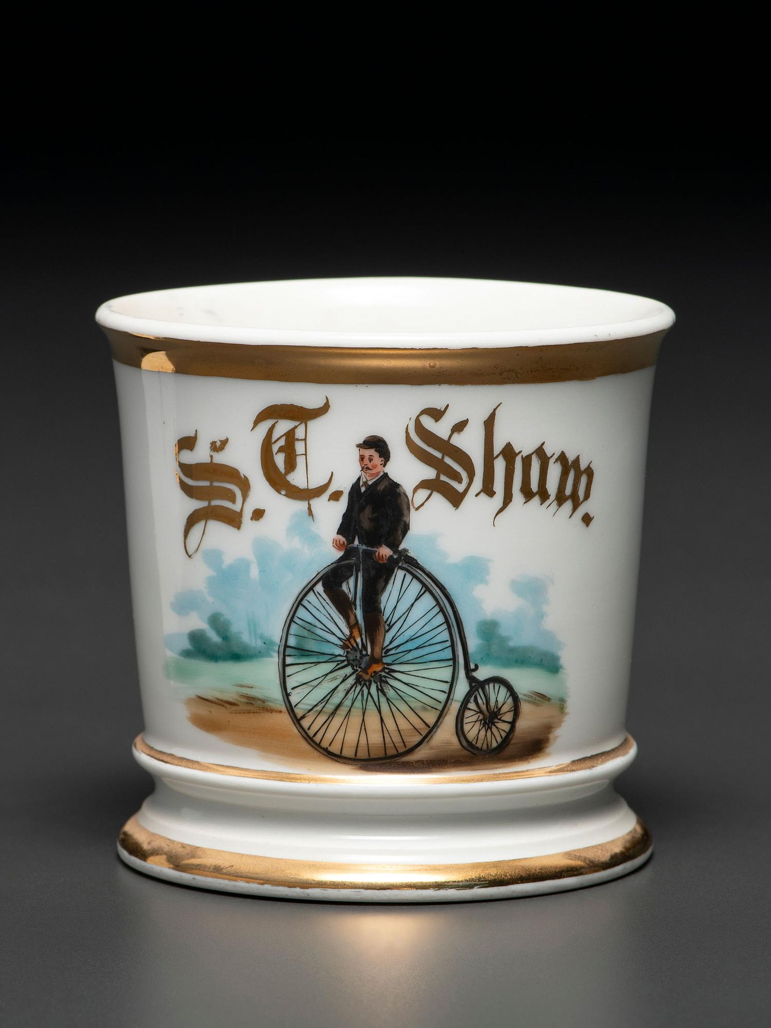 A Porcelain Shaving Mug Depicting a High Wheelman