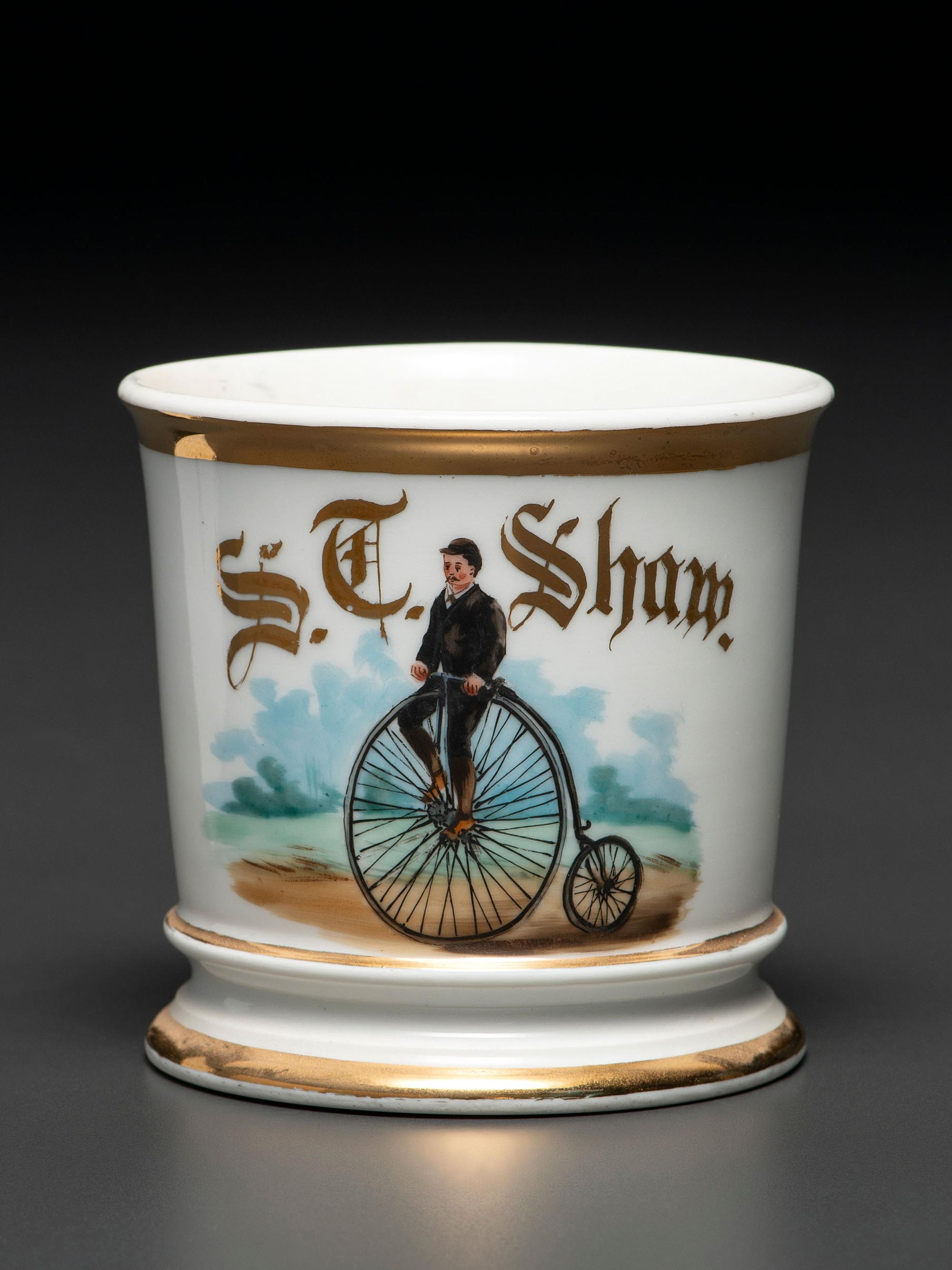 A Porcelain Shaving Mug Depicting a High Wheelman