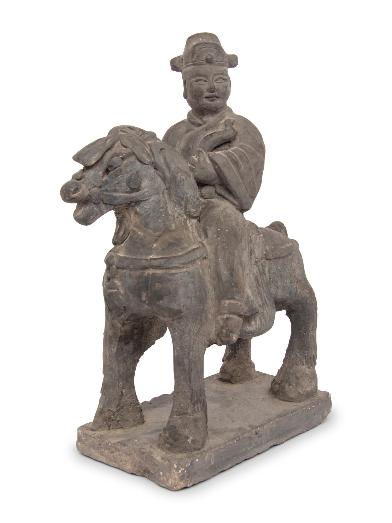 A Chinese Pottery Equestrian Figure, Song to Yuan Dynasty