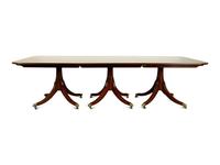 A Regency Style Mahogany Triple Pedestal Dining Table — 20TH CENTURY