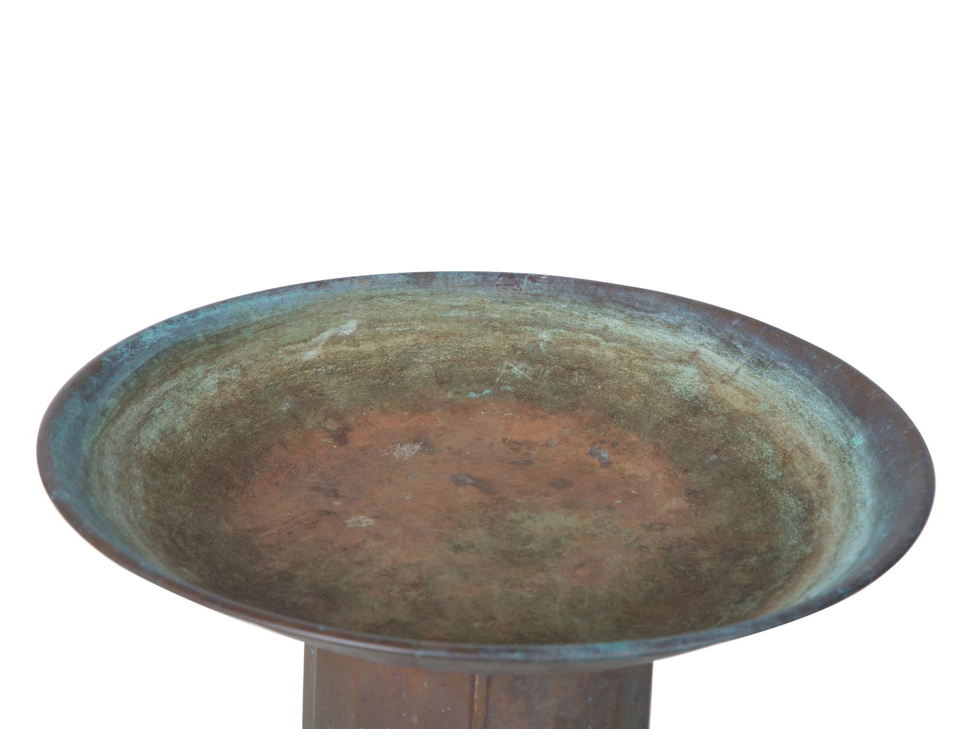 A Pair of Copper Bird Baths — EARLY 20TH CENTURY