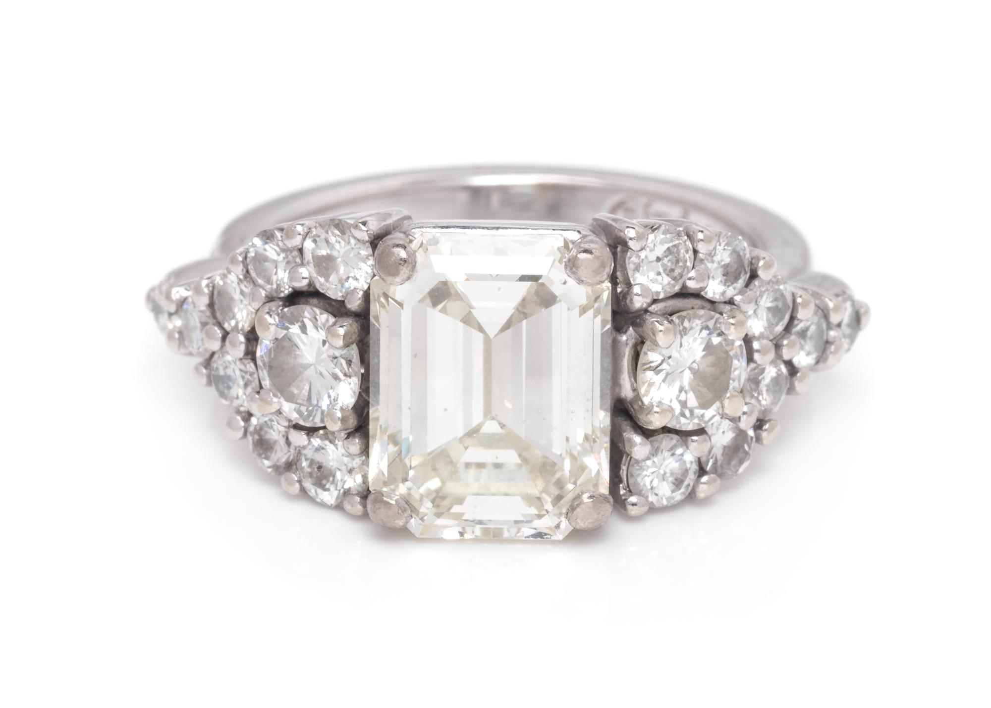 A 14 Karat White Gold and Diamond Ring,