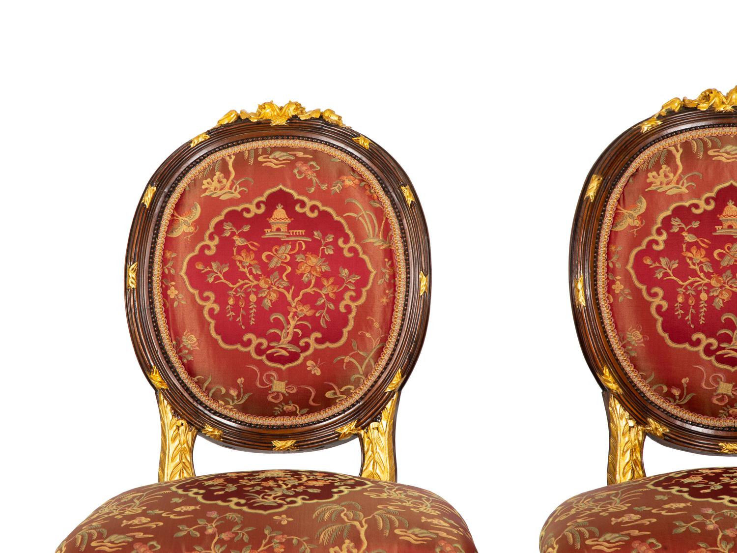 A Pair of Louis XVI Style Stained and Gilt Mahogany Side Chairs.
