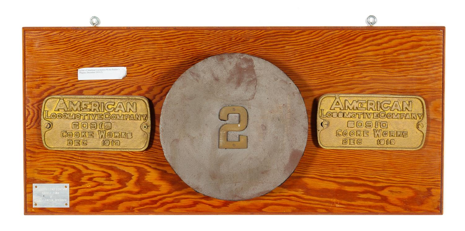 Two Painted Metal American Locomotive Company: Cooke Works Locomotive Badges for the St. Joseph Lead Company.