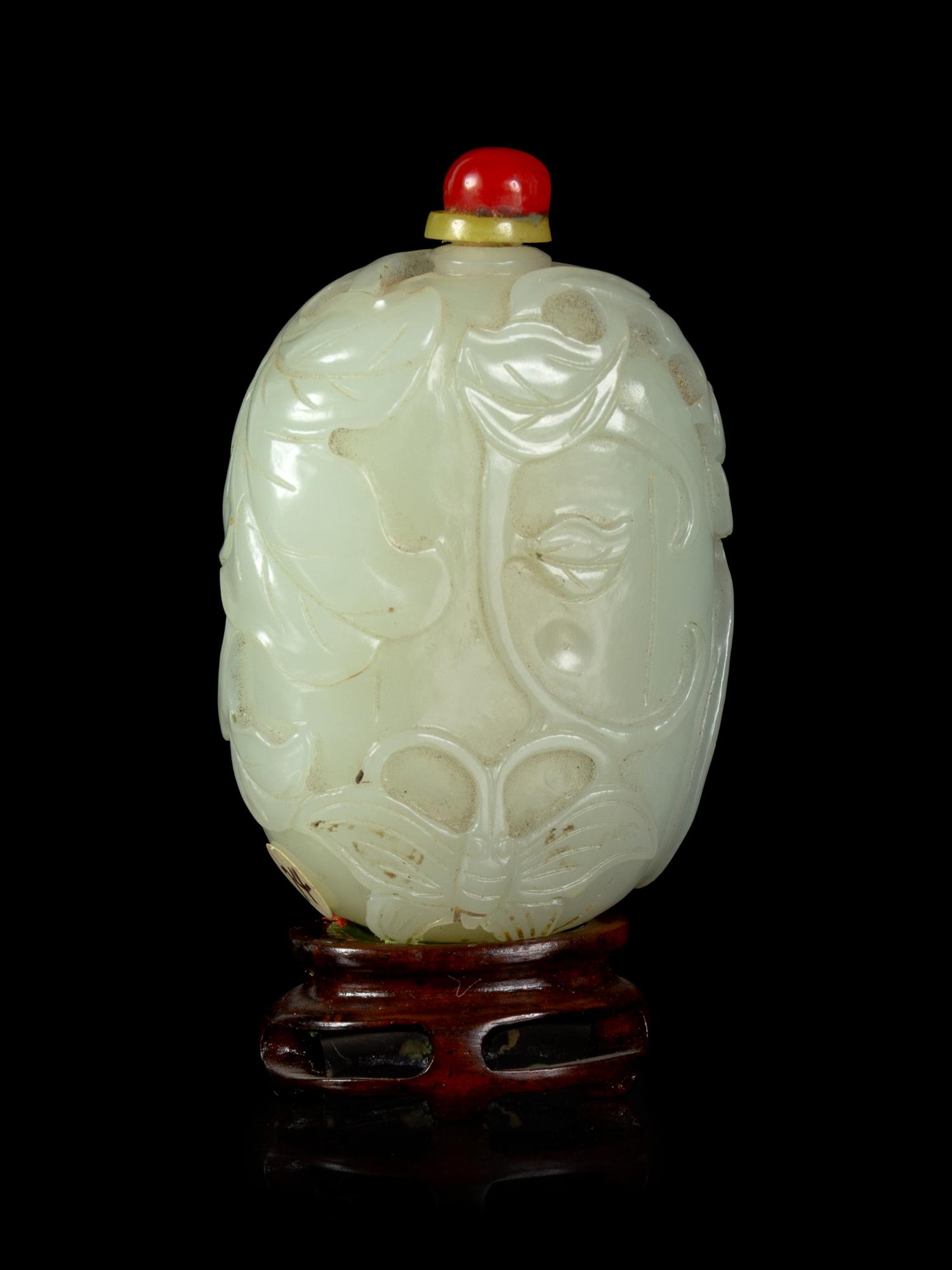 A Pale Celadon Jade Melon-Form Snuff Bottle