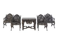 A Suite of Victorian Style Cast Iron Garden Furniture Allegorical of the Seasons