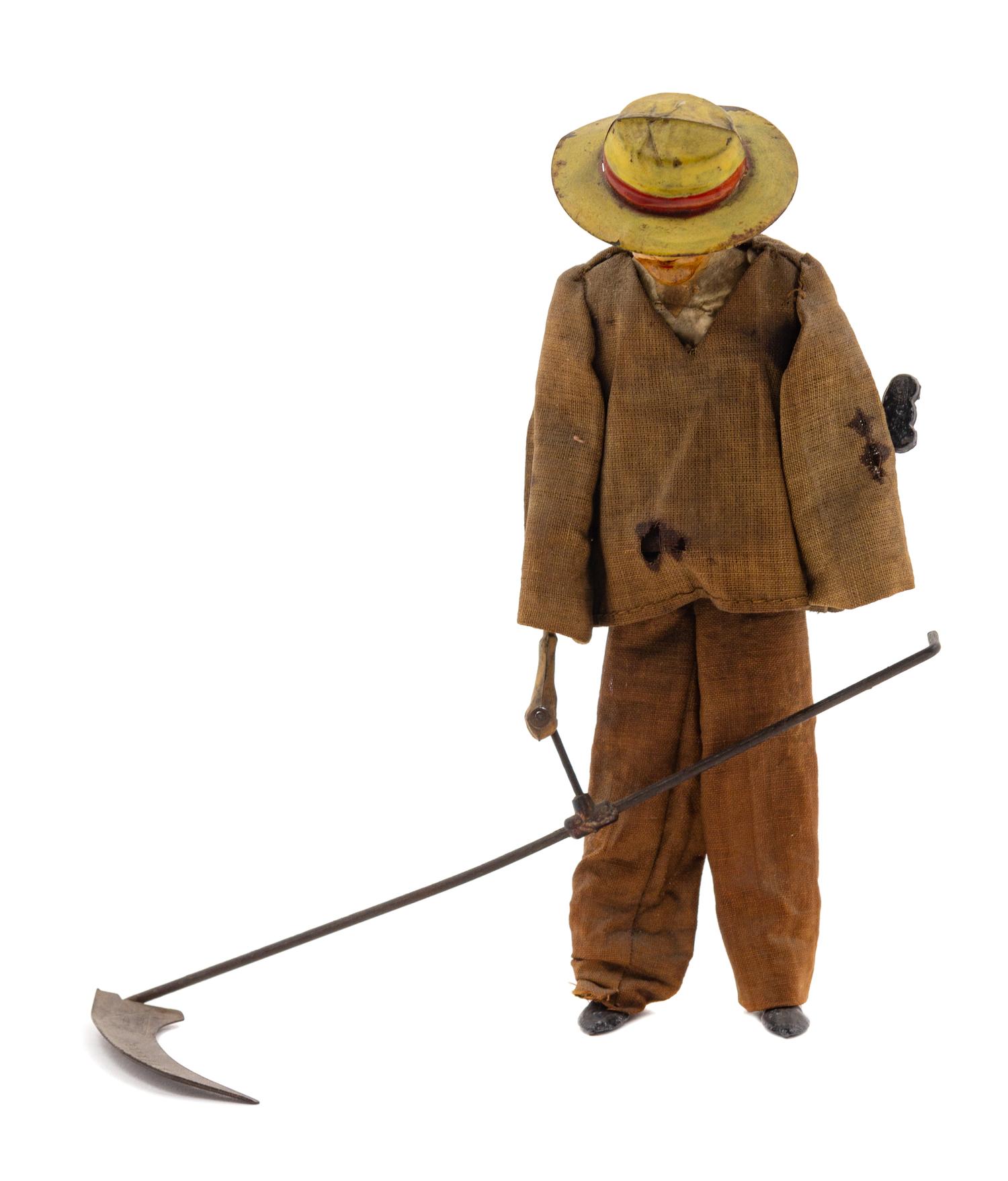 A Fernand Martin Tin Wind-Up "Wheat Farmer" Toy