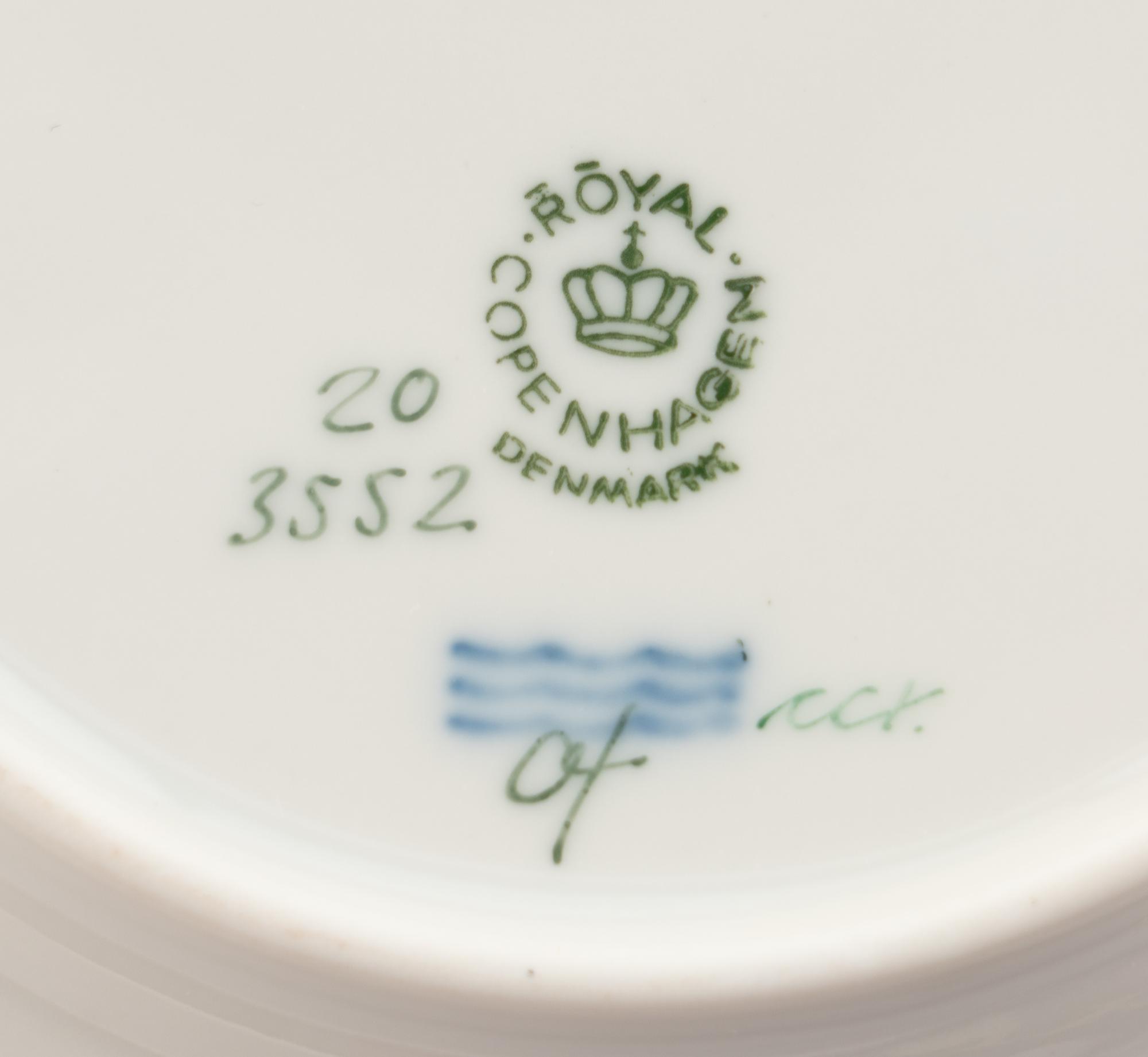 A Set of Eight Royal Copenhagen Flora Danica Porcelain Bread Plates