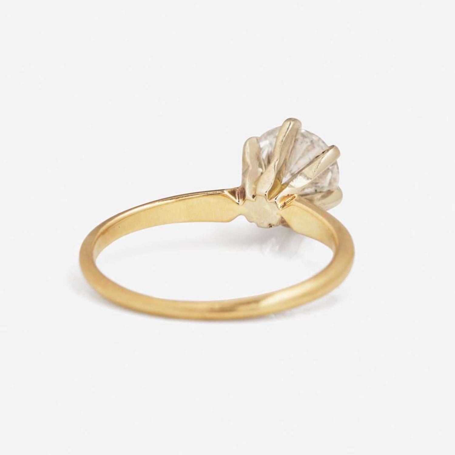 A 14K Yellow Gold Solitaire Diamond Ring