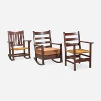 Gustav Stickley (American, 1858-1942) Three Chairs: Arm Rocker No. 2597, an Arm Rocker, and Armchair No. 2618-A, circa 1902