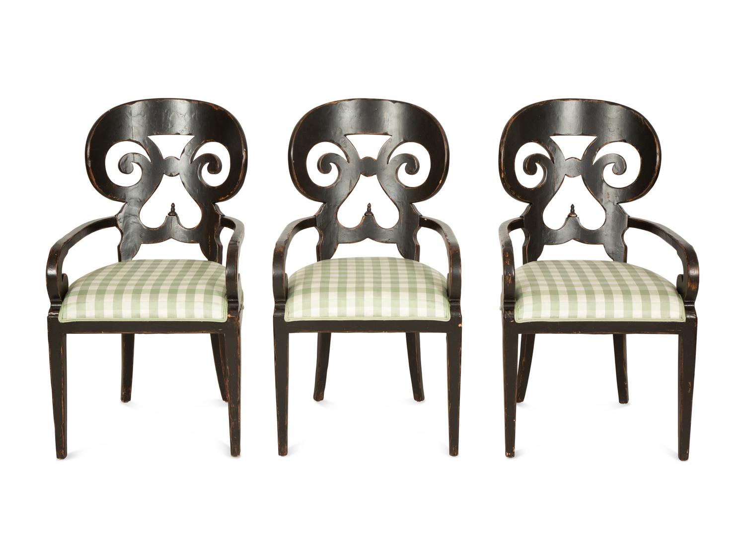 A Set of Six Continental Black Lacquer Scroll Back Armchairs