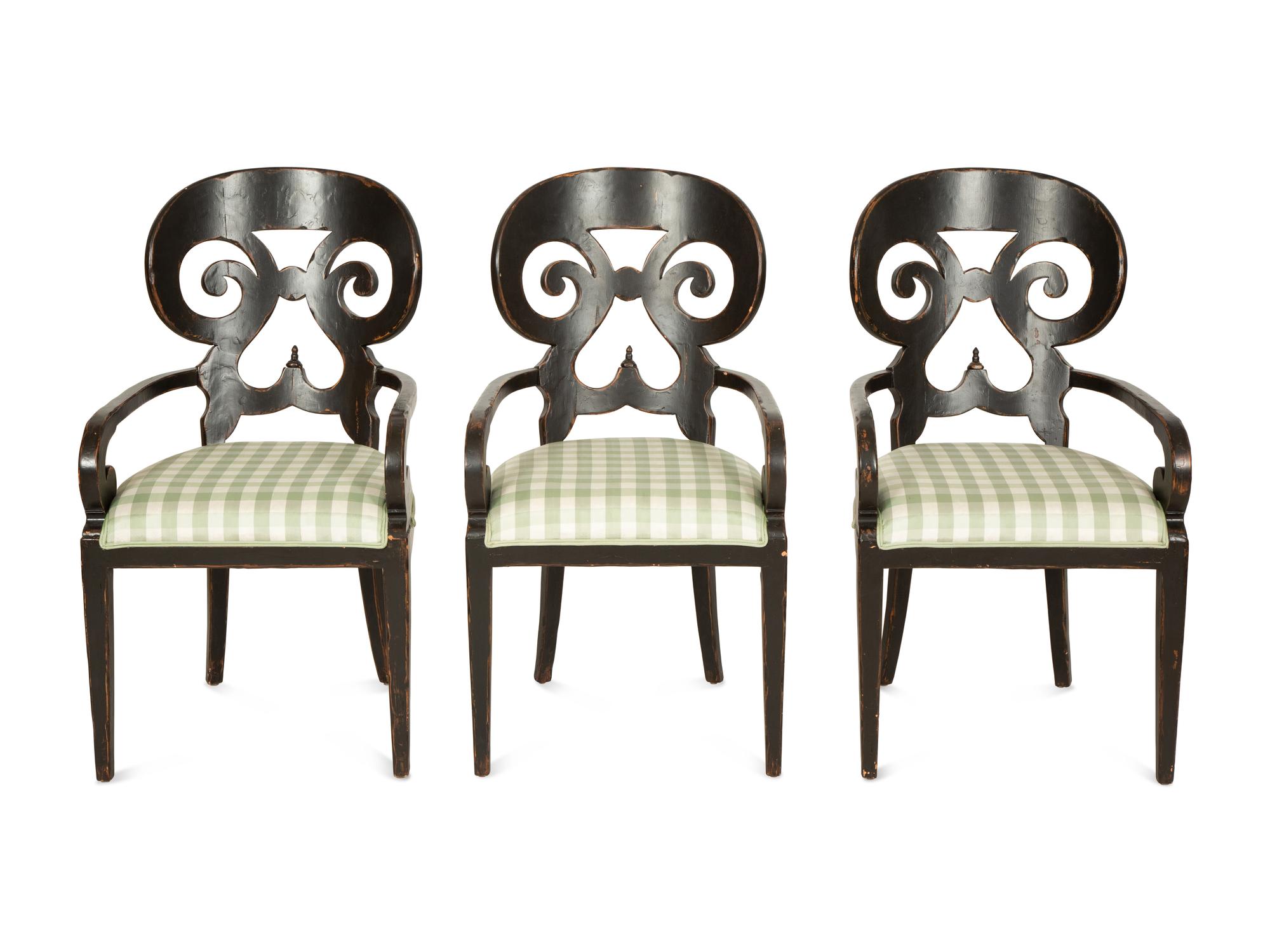 A Set of Six Continental Black Lacquer Scroll Back Armchairs