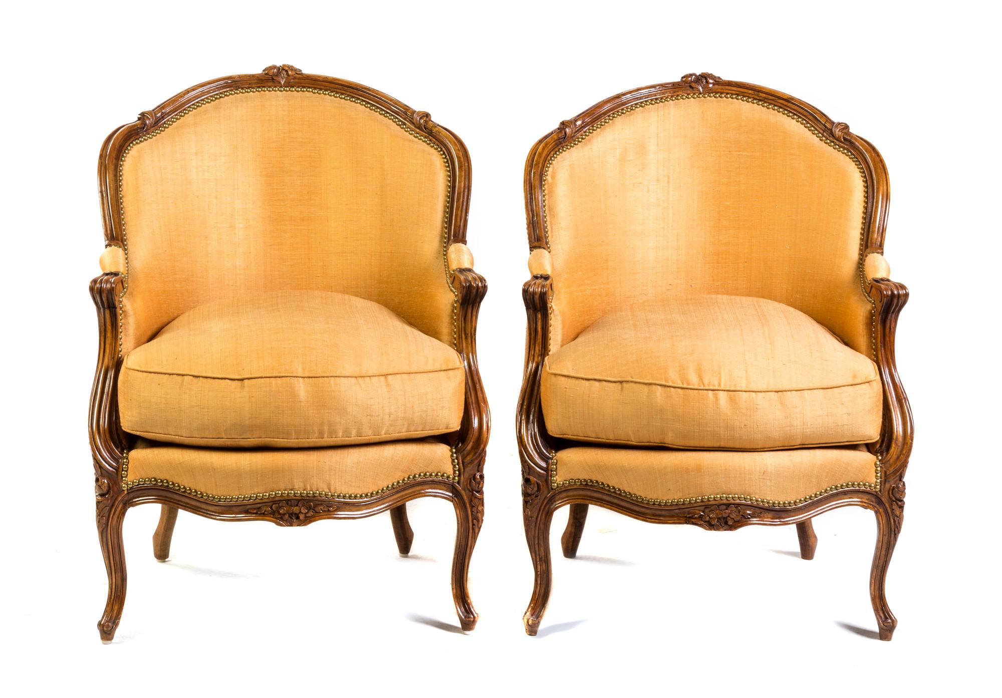 A Pair of Louis XV Style Walnut Bergeres Height 34 inches. — LATE 19TH CENTURY