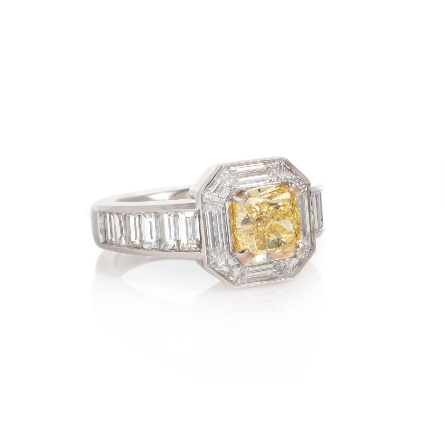 FANCY INTENSE YELLOW DIAMOND AND DIAMOND RING