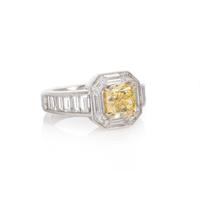 FANCY INTENSE YELLOW DIAMOND AND DIAMOND RING