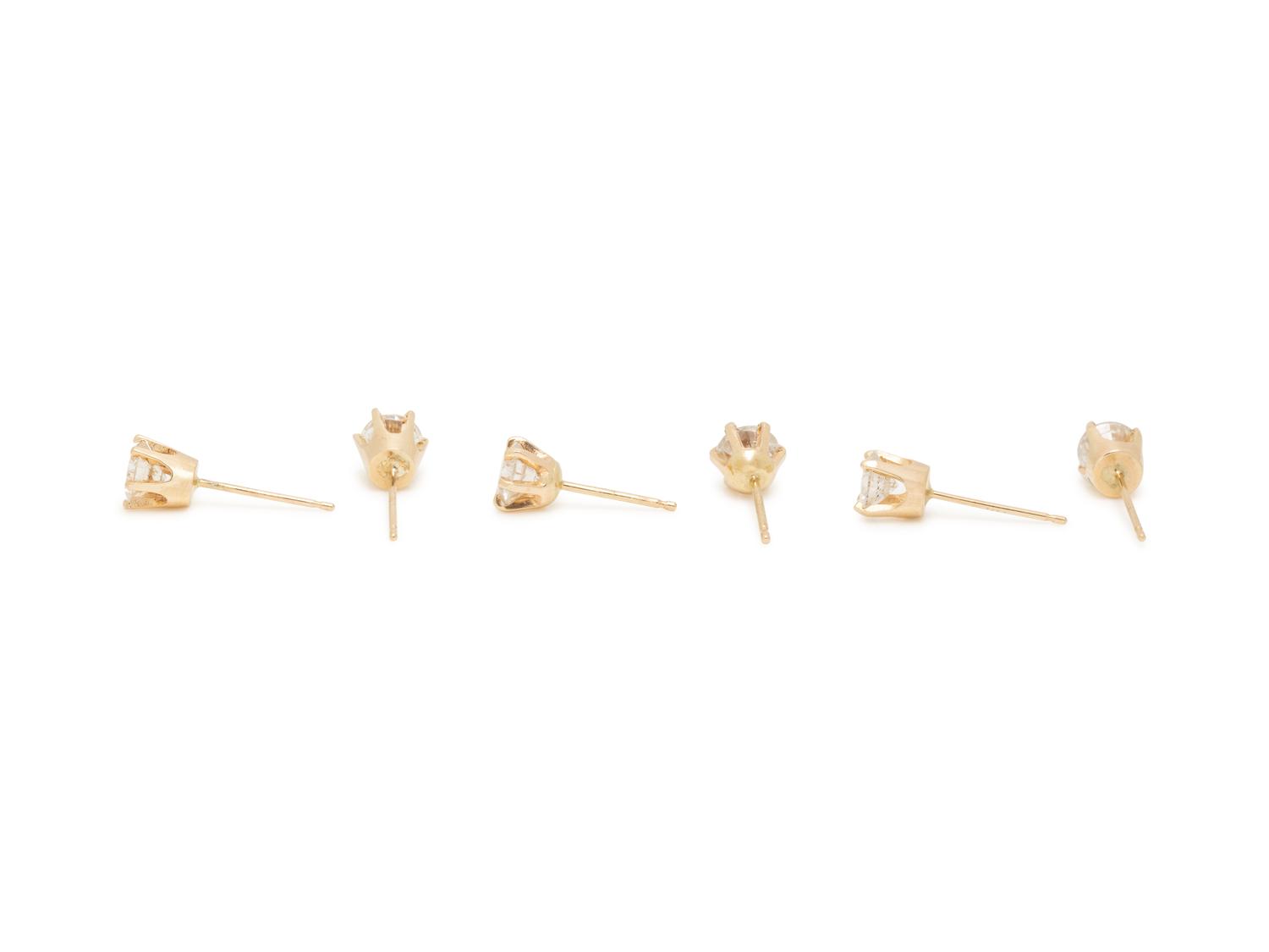 THREE PAIRS OF YELLOW GOLD AND DIAMOND STUD EARRINGS