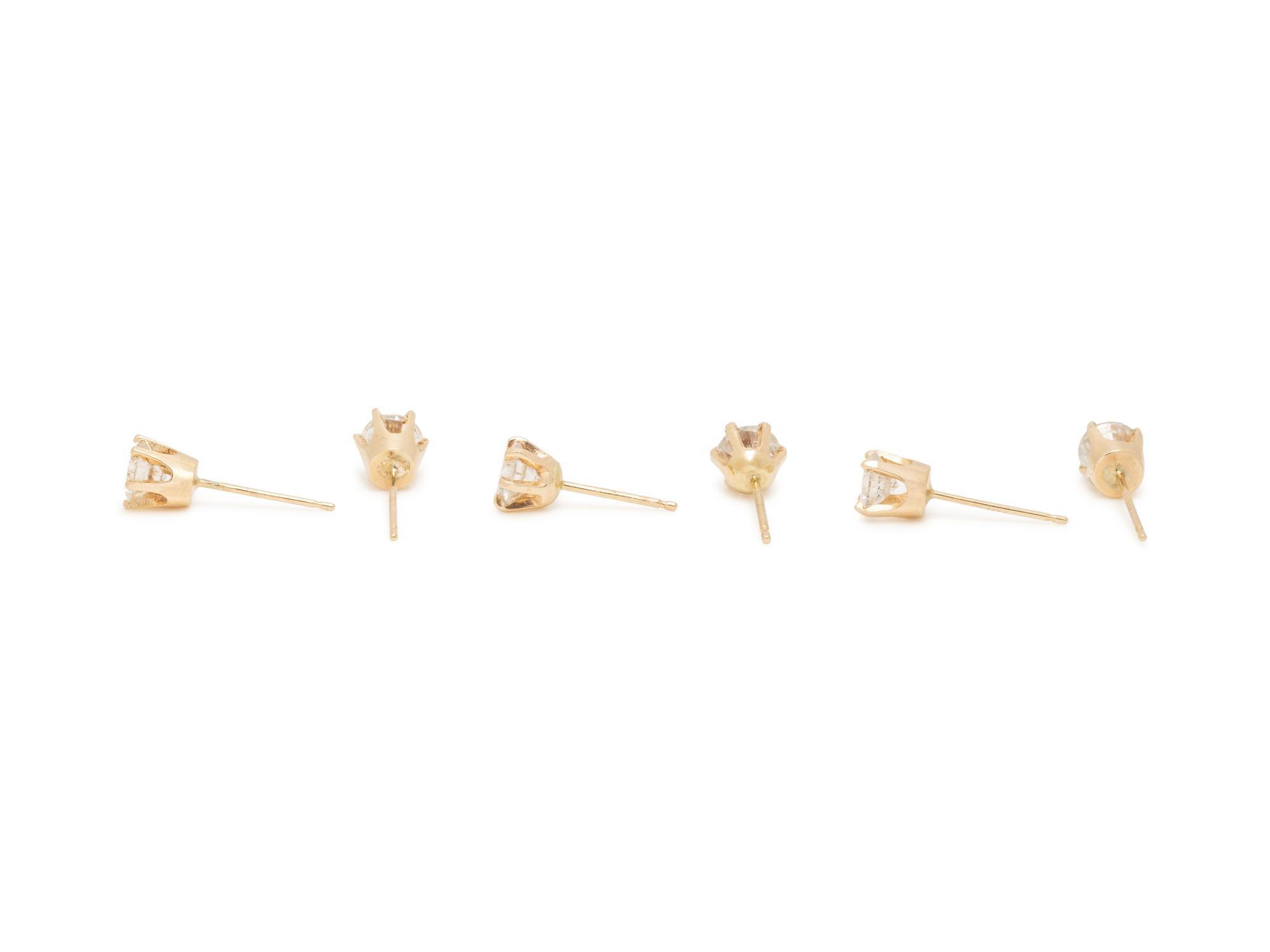 THREE PAIRS OF YELLOW GOLD AND DIAMOND STUD EARRINGS