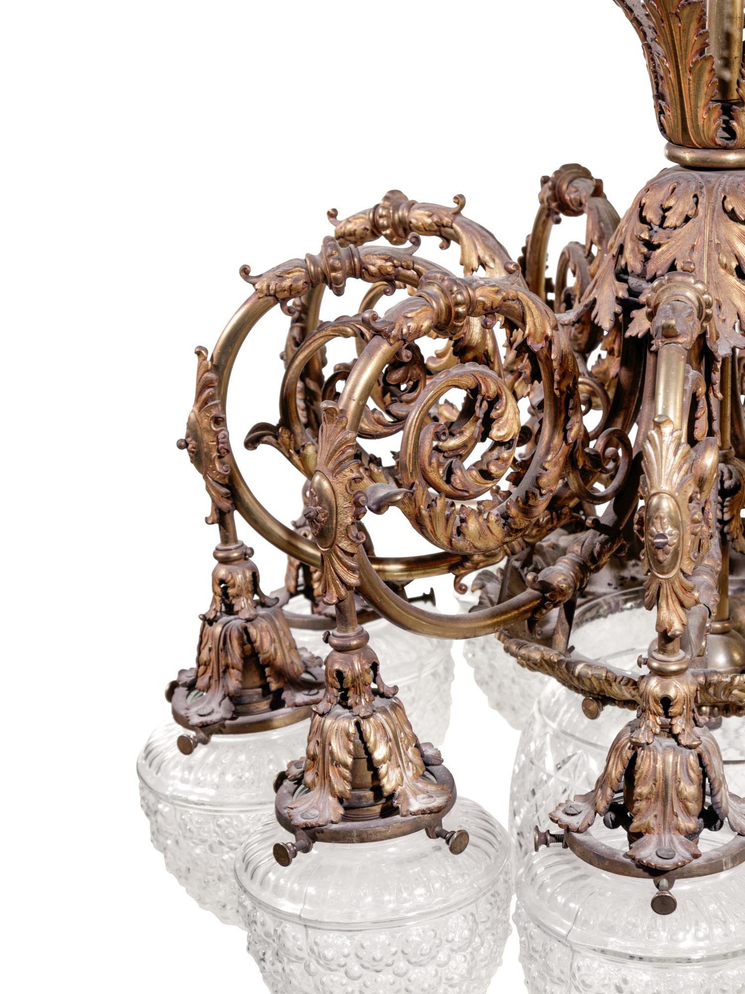 A French Gilt Bronze and Glass Globular Chandelier