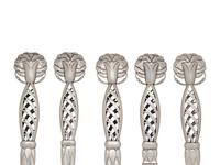 A Group of Eight Georg Jensen Silver Ornamental Serving Articles
