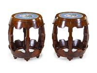 A Pair of Porcelain Plaque Inset Hardwood Garden Stools