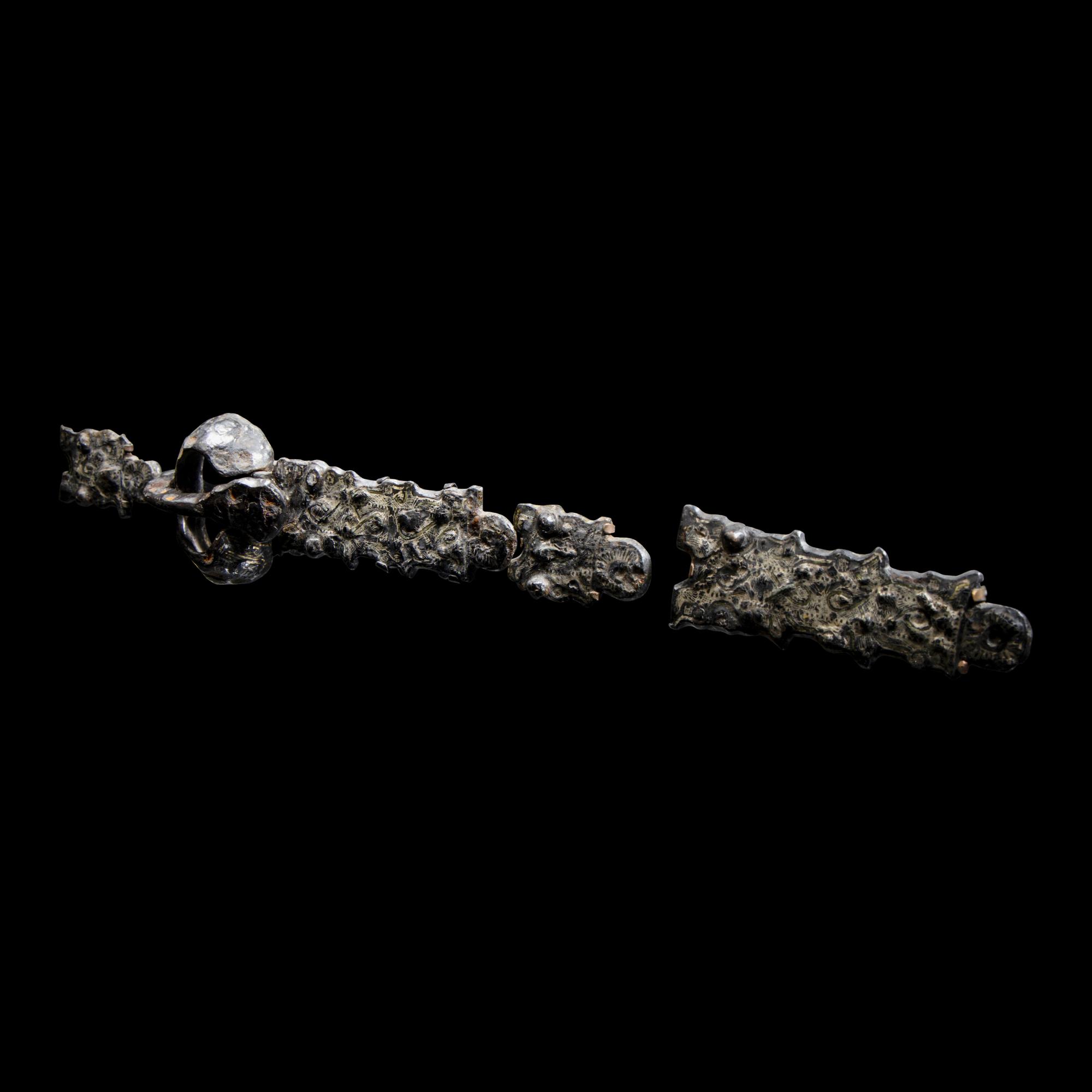Five Migration Period Iron and Silver Belt Attachments