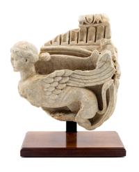 A Roman Marble Ionic Capital Height 14 1/2 x width 13 inches. — FIRST CENTURY A.D.