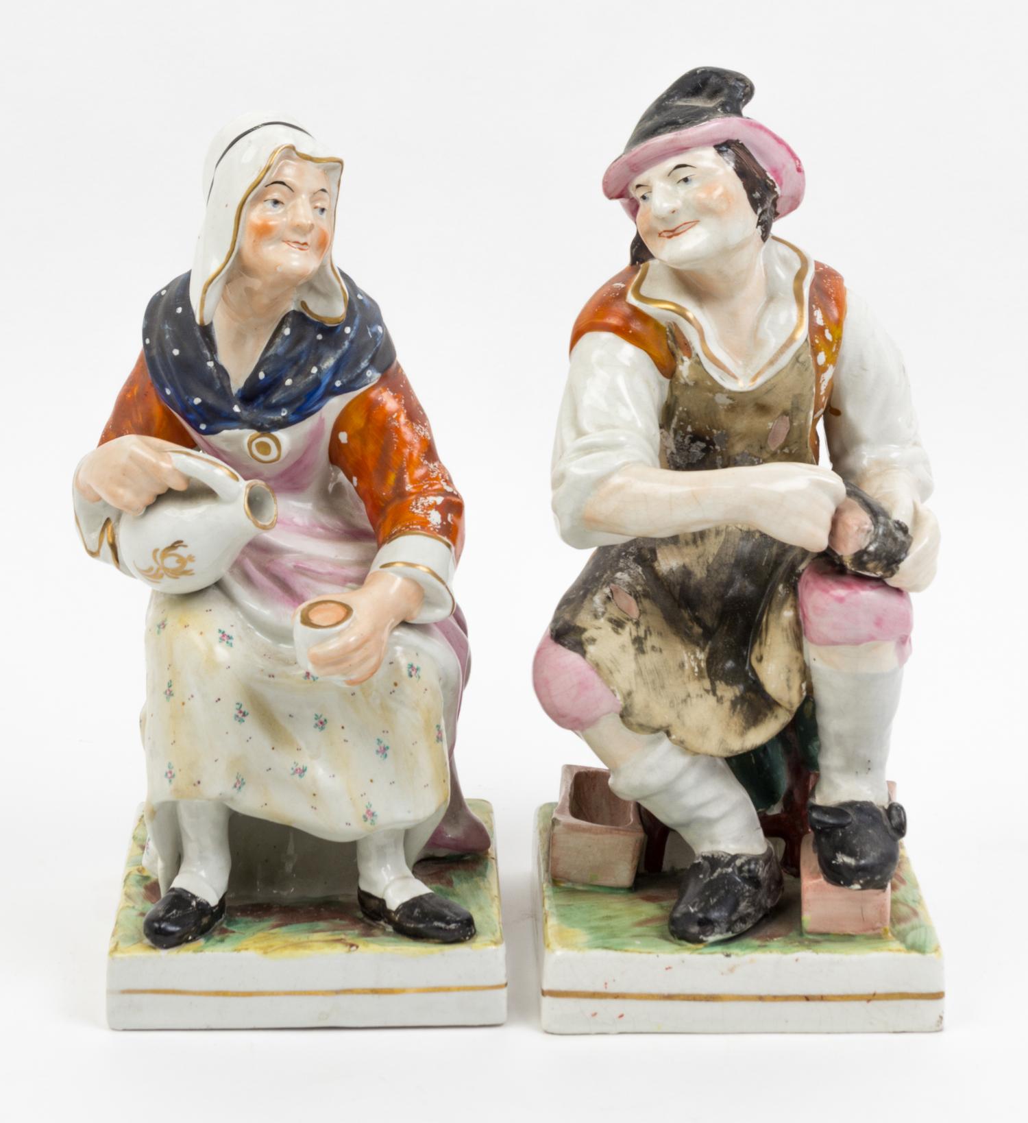 A Pair of Staffordshire Figures Height 12 1/2 inches.