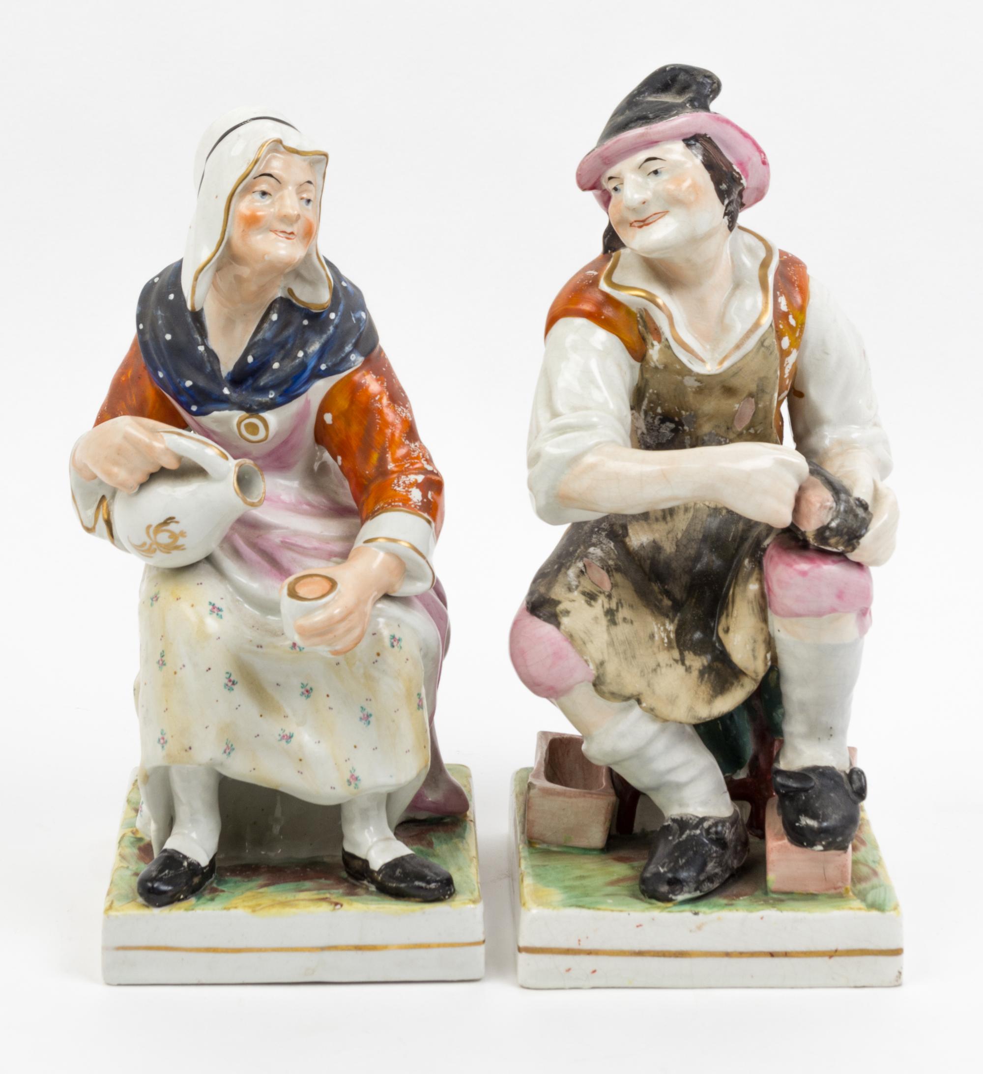 A Pair of Staffordshire Figures Height 12 1/2 inches.