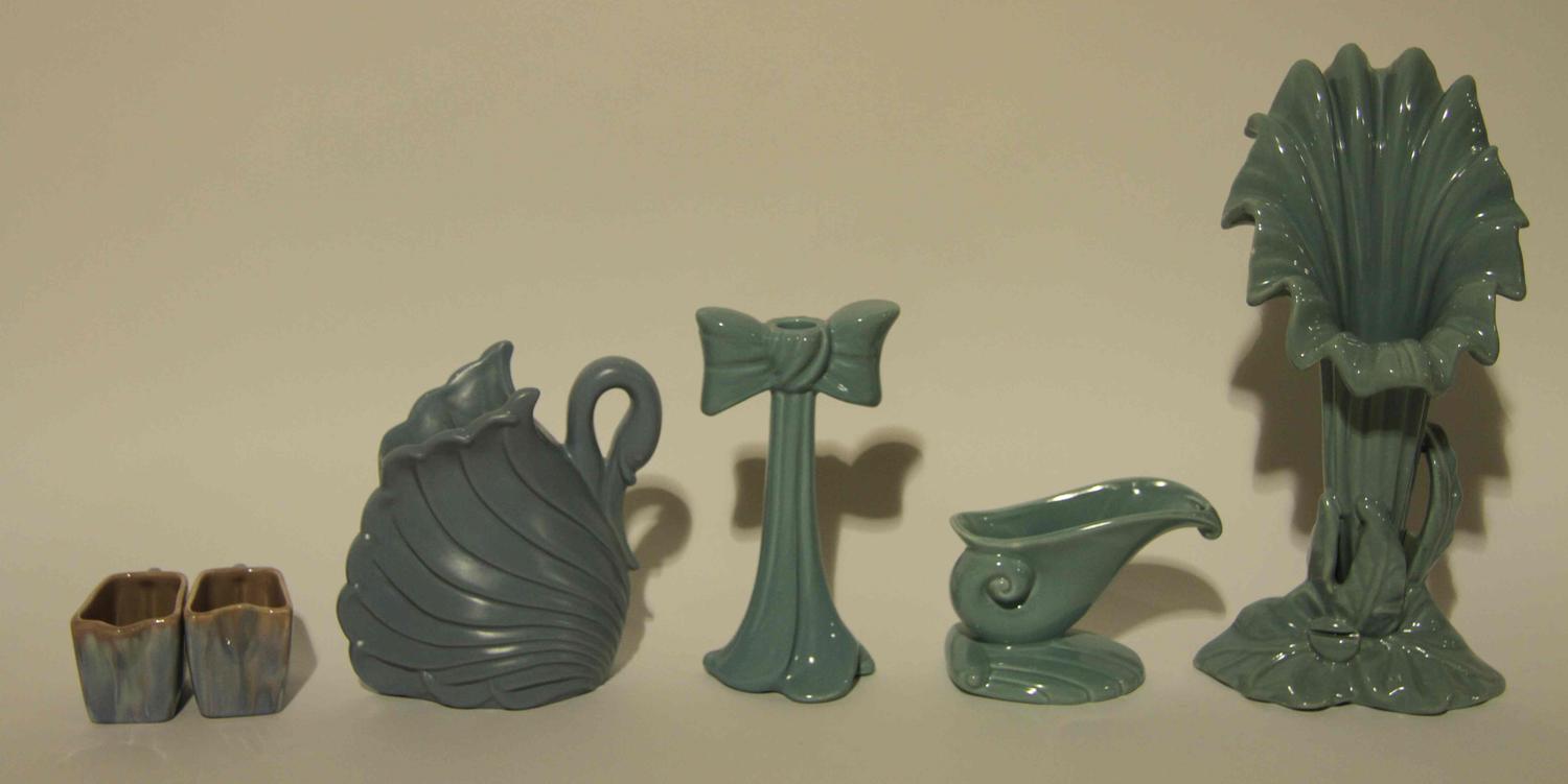 A Group of Nine Haeger Pottery Articles Width of widest 18 3/4 inches.