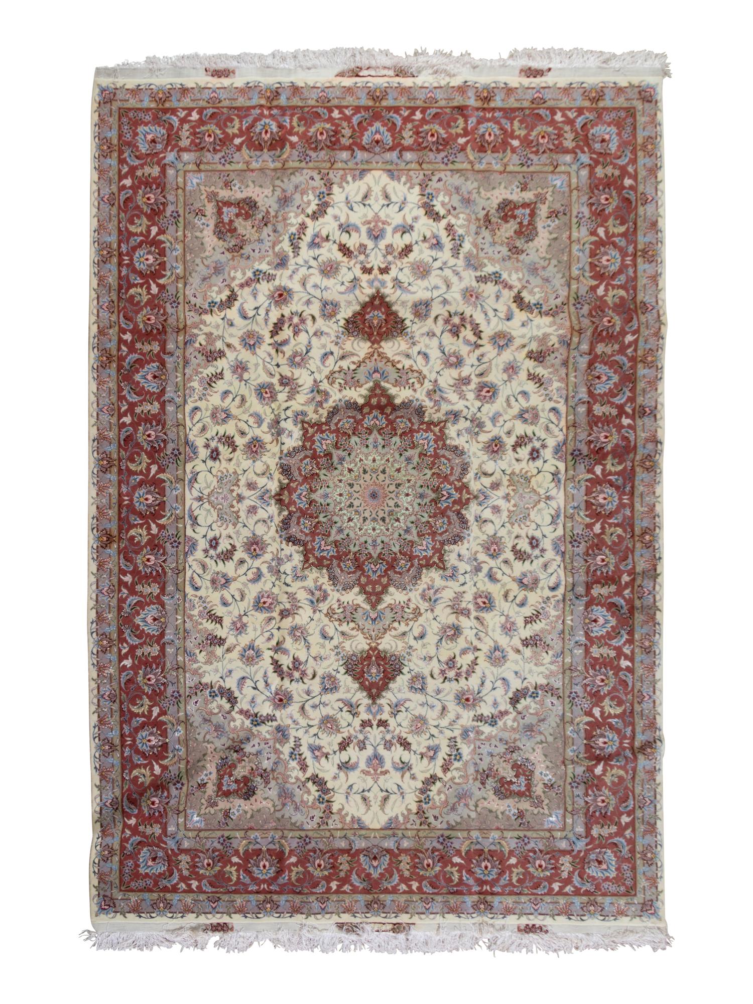 A Tabriz Silk and Wool Rug