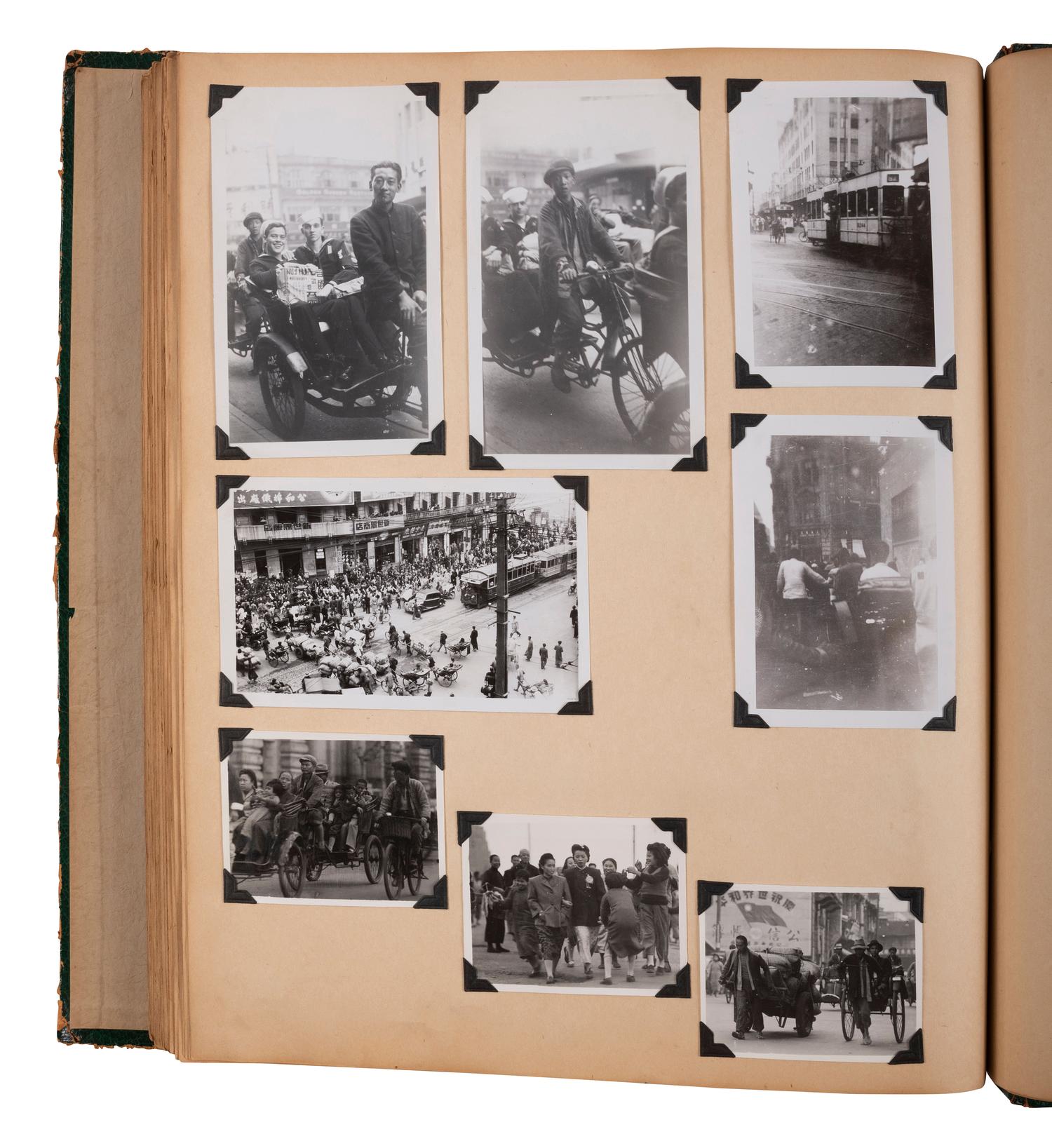 [WORLD WAR II]. Extensive US Navy album identified to James Sumner Douglass, Yeoman First Class, USS Lavaca, featuring pre-war and war-date photographs of Tinian Island, aerial reconnaissance, atomic bomb carriers, and more.